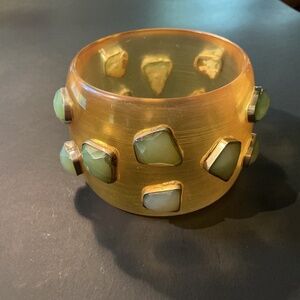 Faceted bezel set stones wide lucite bangle